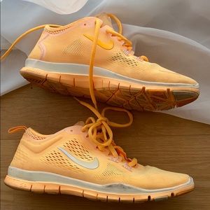 Orange melon nike free sneakers